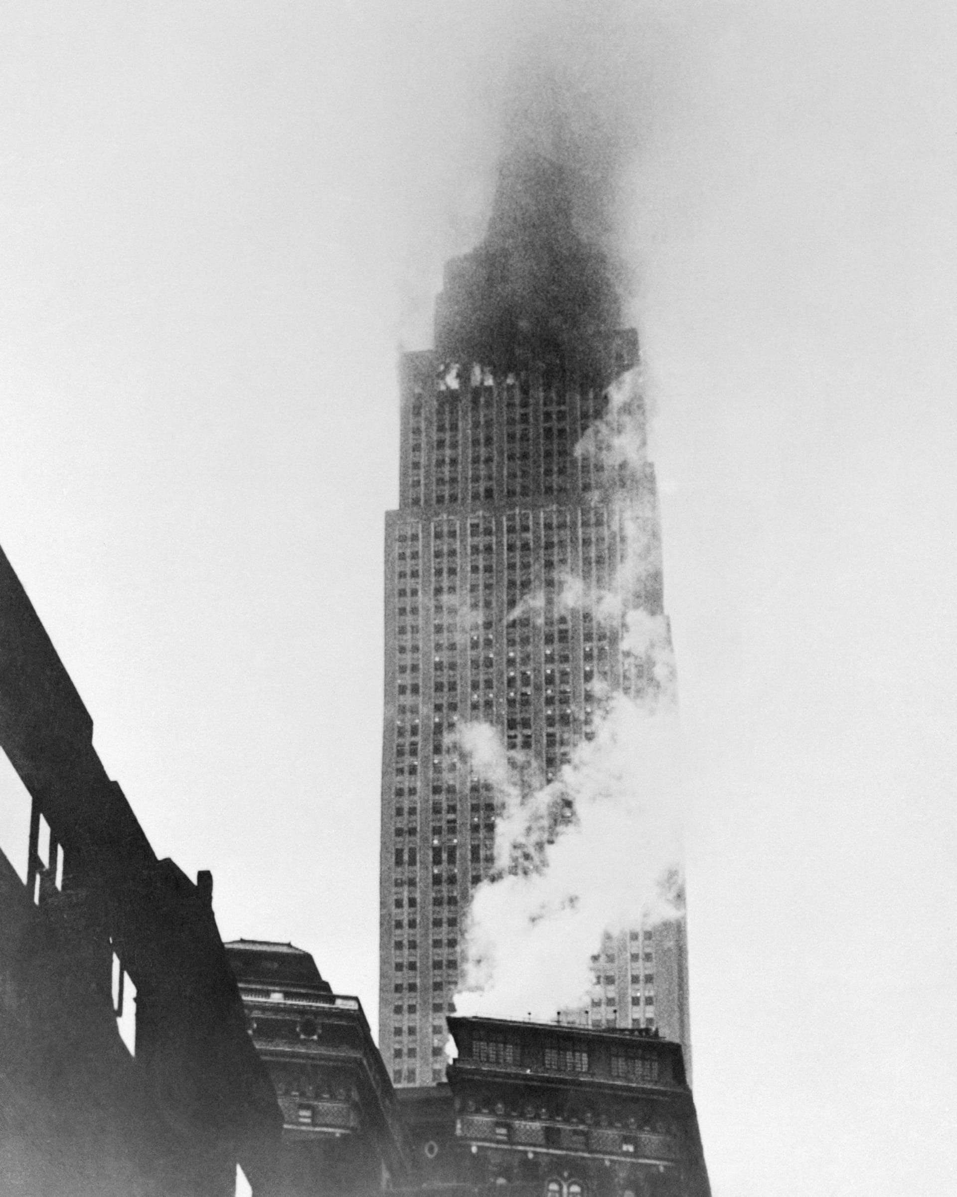 The Empire State Building on fire following the impact. The Empire State Building on fire following the impact.