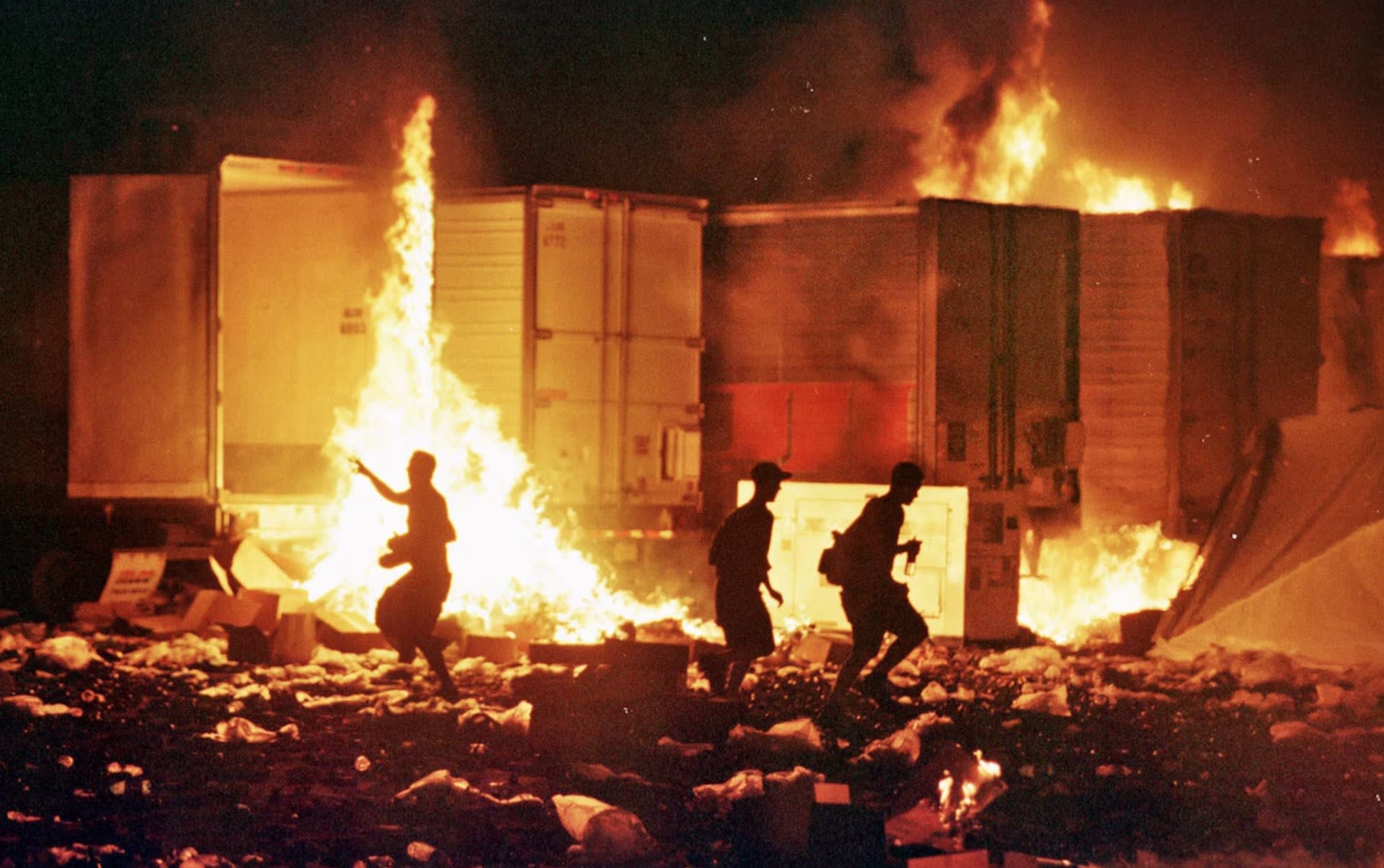 Trucks lit on fire during the last day of the festival. Trucks lit on fire during the last day of the festival.