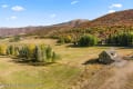 Showing the barn and pasture