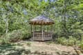 Sweet gazebo in the yard overlooking 100 acres of Nature Conservancy land.