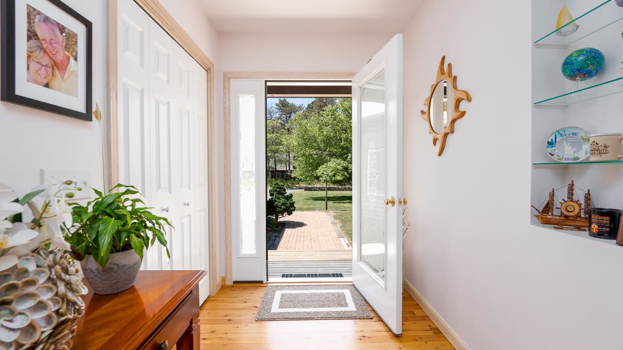 Front door with light-filled entrance foyer