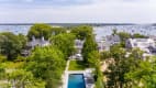 Aerial view of this expansive property with looking beyond to the Edgartown Harbor