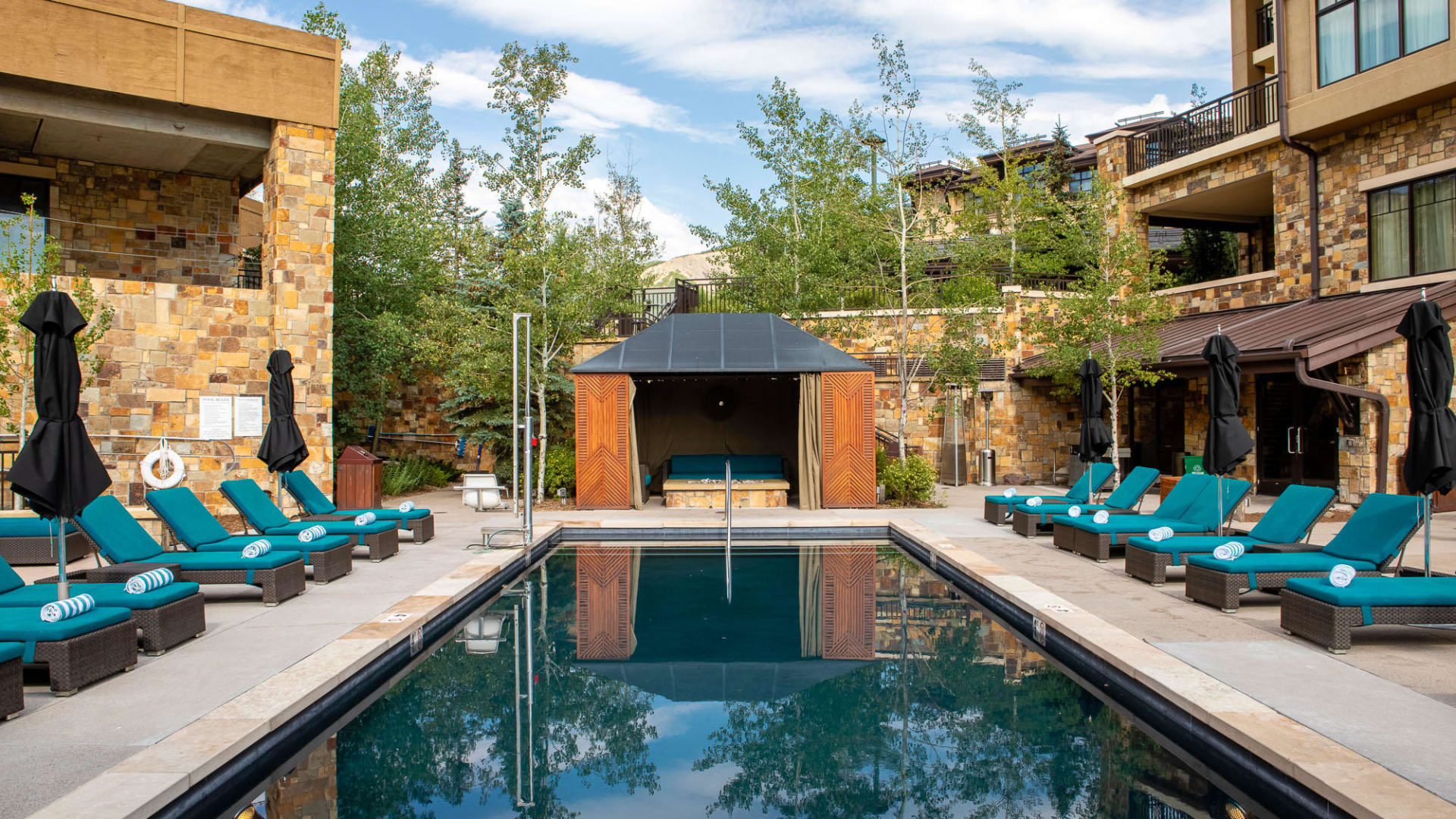 Pool area cabana with firepit