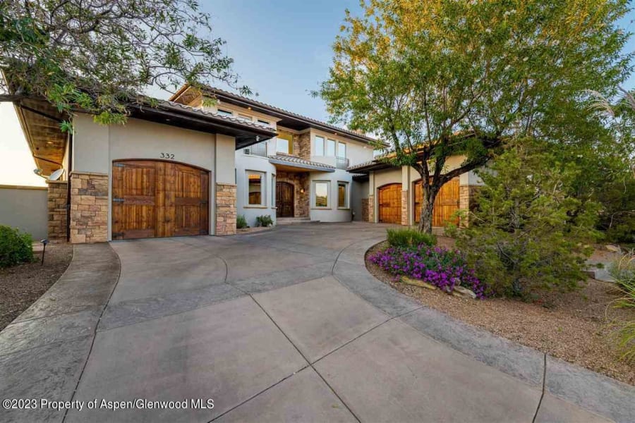 Entry, 3 car heated garage spaces