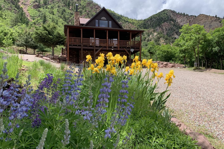 283 Cherokee flowers and house