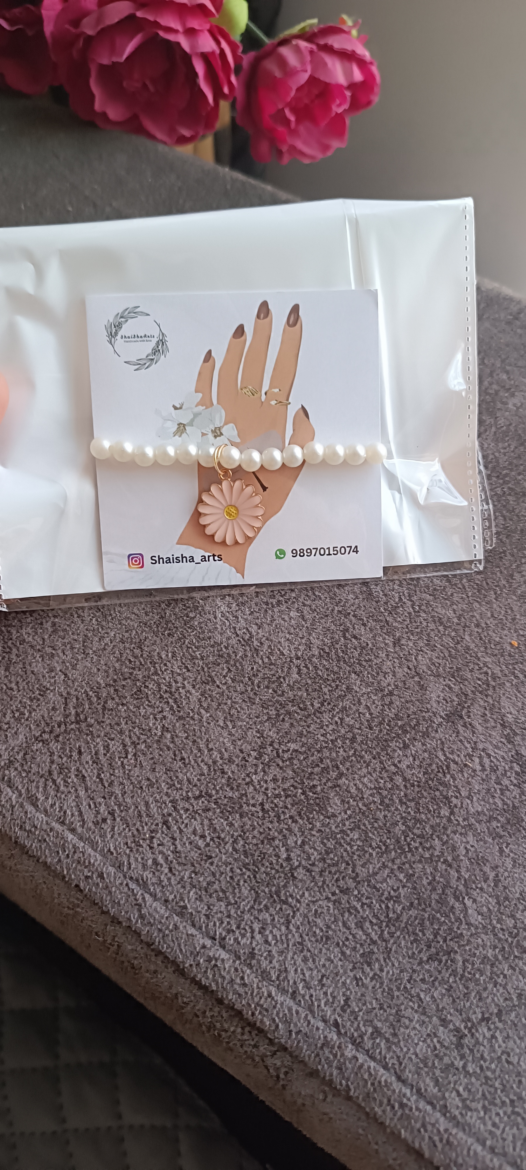Pearl bracelet with beautiful charms