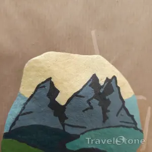 Painted painting stone by artist nad_doodles showing landscape. Berge.