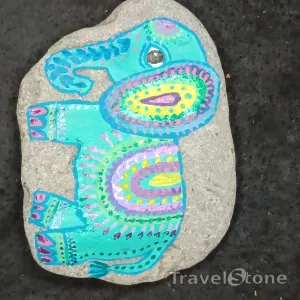 Painted painting stone by artist nad_doodles showing animals. Elefant Mandala hellblau .