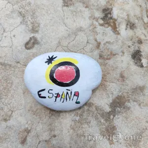 Painted painting stone by artist CJ showing fantasy. Viva Espagna.