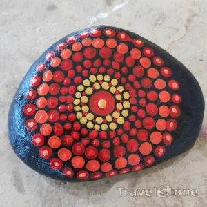 Painted dotting stone by artist LaLiLu showing pattern. Mandala Dotting.