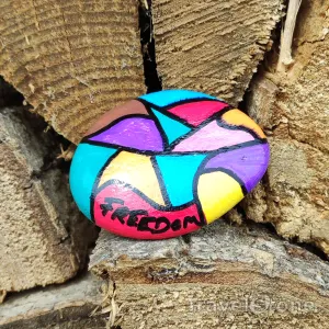 Painted painting stone by artist LaLiLu showing pattern. I've been looking for freedom.. .