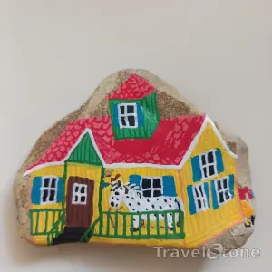 Painted painting stone by artist nad_doodles showing fantasy. Pippis Villa .