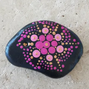 Painted dotting stone by artist LaLiLu showing pattern. Mandala.