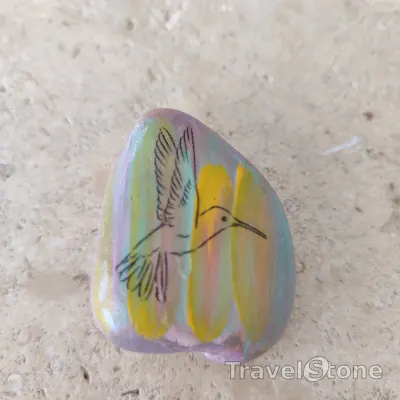 Painted painting stone by artist CJ showing animals. Bird TravelStone.