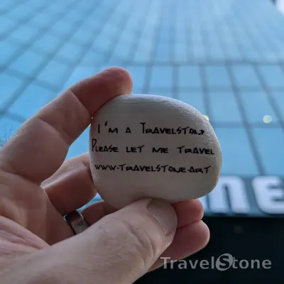 Painted painting stone by artist Ella showing sayings. I'am a travelstone! Please let me travel.