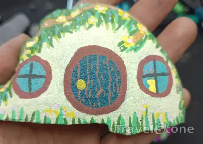 Painted painting stone by artist nad_doodles showing other. Hobbit Villa .