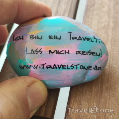 Painted painting stone by artist CJ showing sayings. Let me travel.