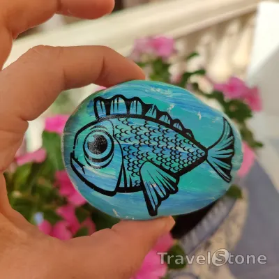 Painted painting stone by artist CJ showing animals. TravelStone in Javea, Spain.