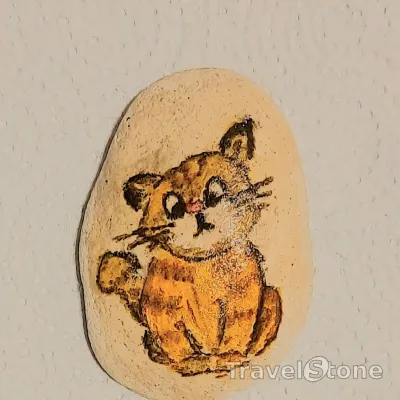 Painted painting stone by artist Anastasiia showing animals. Зроблено підчас подорожі в Празі.