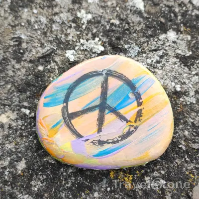 Painted painting stone by artist LaLiLu showing pattern. Peace.