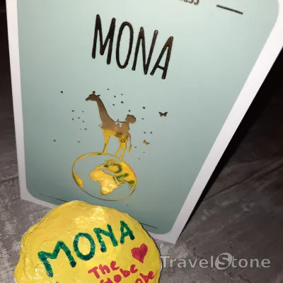 Painted painting stone by artist Armani showing special occasion. Mona love stone - the love between 2 world travelers created the spark of new life. With her beautiful eyes, Mona wants to see all the beauty in the world. .