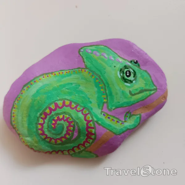 Painted painting stone by artist nad_doodles showing animals. Chameleon