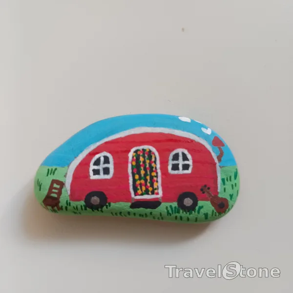 Painted painting stone by artist nad_doodles showing landscape. Camper