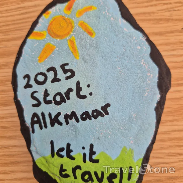 Painted painting stone by artist paulzuurbier showing landscape. Our first travel stone, starting in Alkmaar NL.