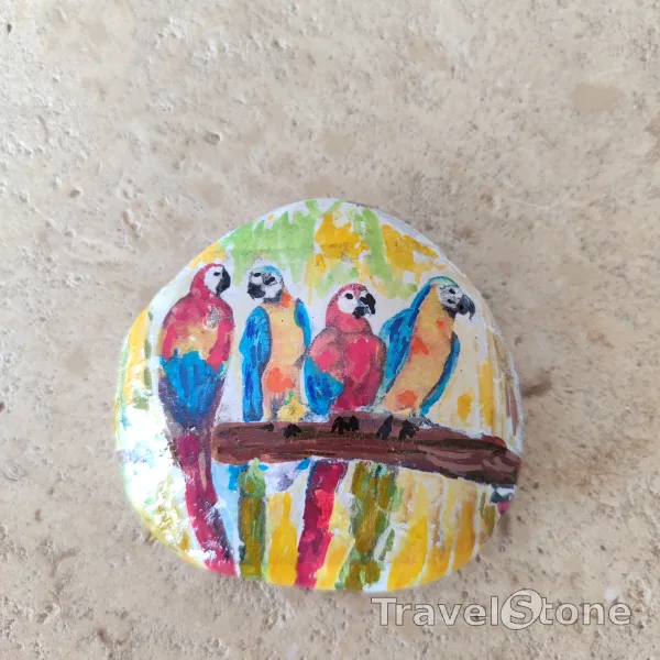 Painted painting stone by artist CJ showing animals. Bird TravelStone