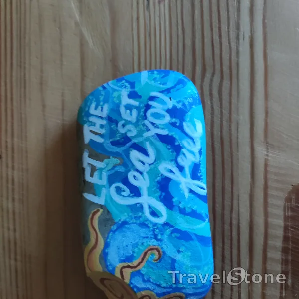 Painted painting stone by artist nad_doodles showing sayings. Let the sea set you free