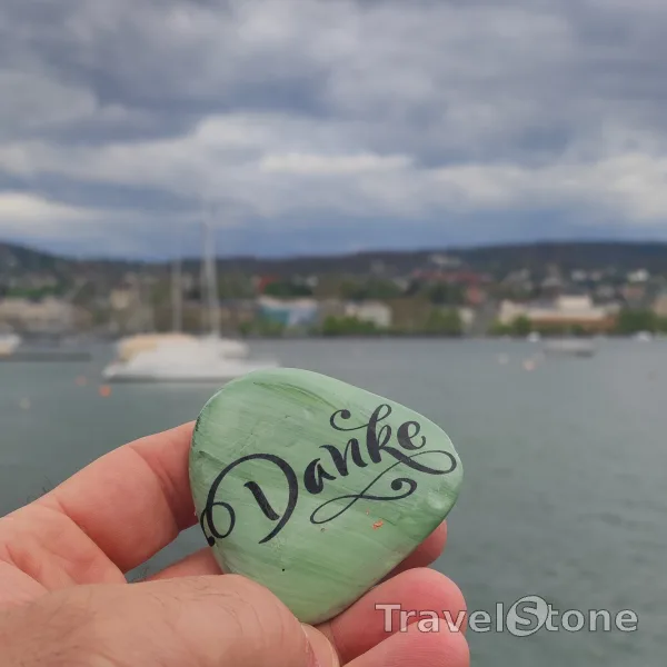 Painted painting stone by artist LaLiLu showing sayings. Öfter Danke sagen!