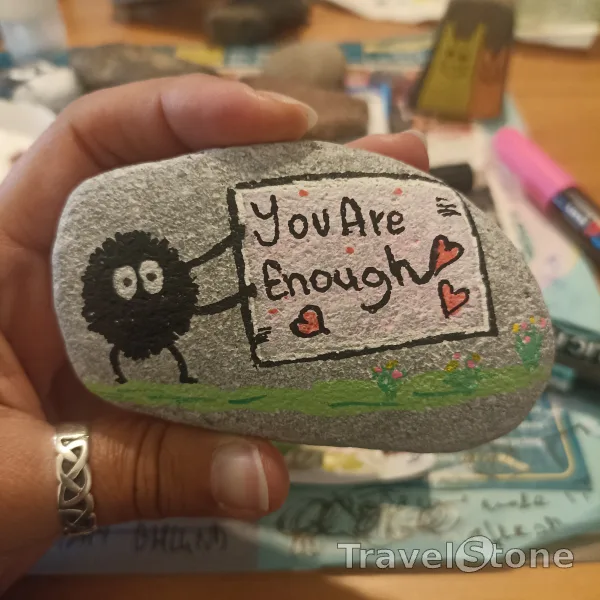 Painted painting stone by artist comfortinstones showing comic. You are enough