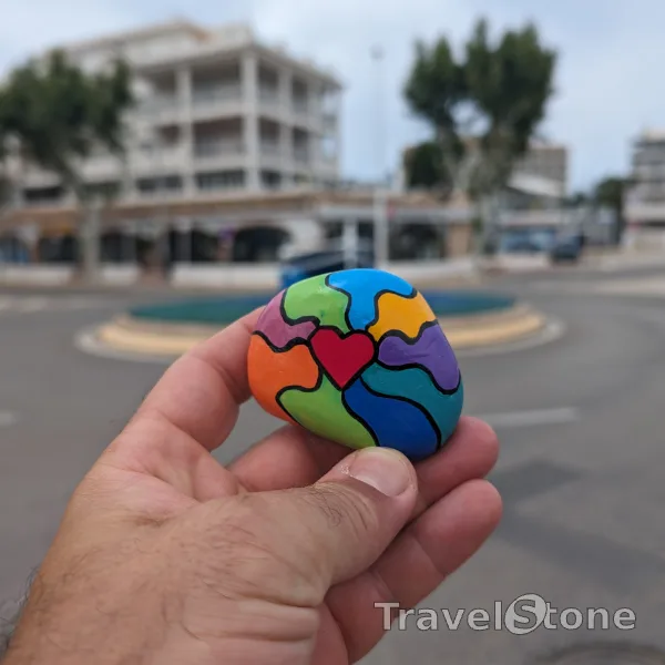 Painted painting stone by artist LaLiLu showing pattern. Colorful heart