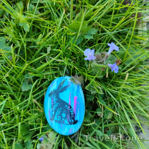 Painted painting stone by artist LaLiLu showing special occasion. Easter TravelStone
