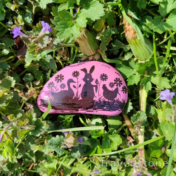 Painted painting stone by artist LaLiLu showing special occasion. Easter scene- TravelStone