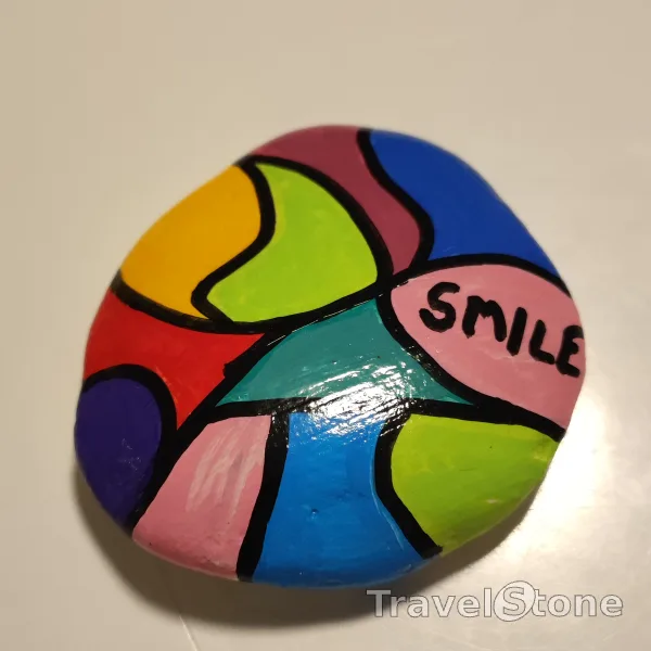 Painted painting stone by artist LaLiLu showing pattern. Lachen ist die beste Medizin