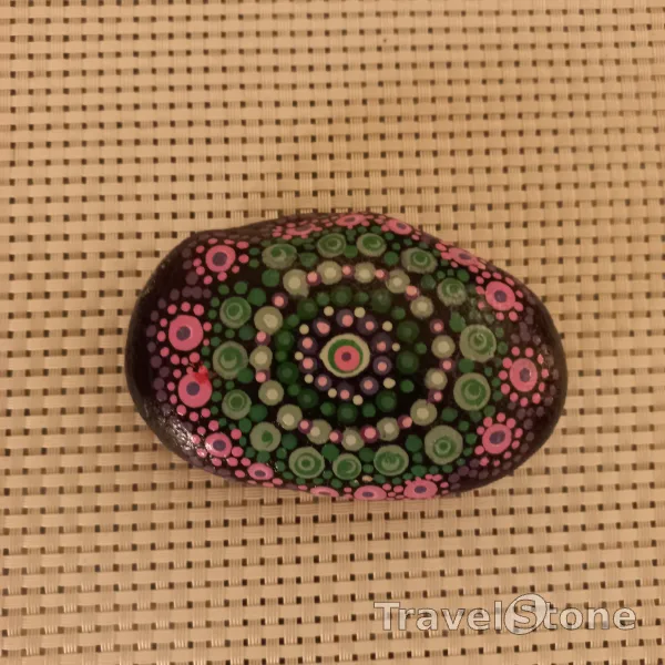Painted dotting stone by artist Yumi showing pattern. Mandalastein
