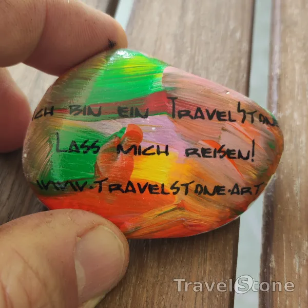 Painted painting stone by artist CJ showing sayings. Let me travel