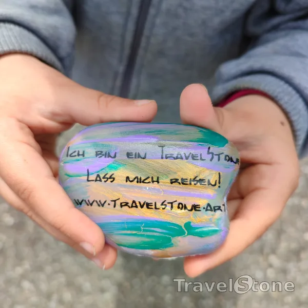 Painted painting stone by artist CJ showing sayings. Let me travel
