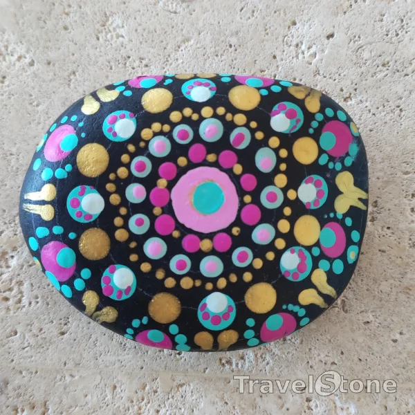 Painted dotting stone by artist LaLiLu showing pattern. Mandala
