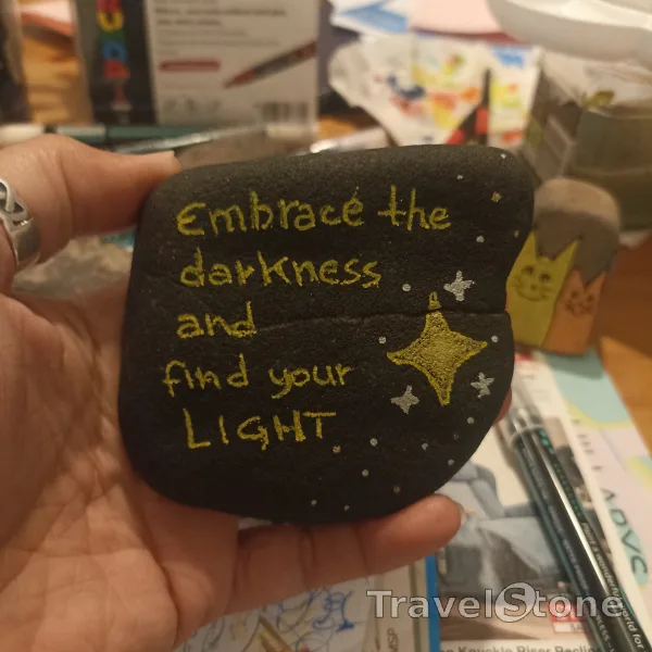 Painted painting stone by artist comfortinstones showing sayings. Embrace the darkness and find your light