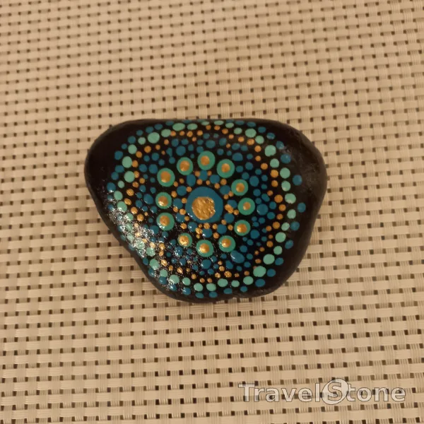 Painted dotting stone by artist Yumi showing pattern. Mandalastein