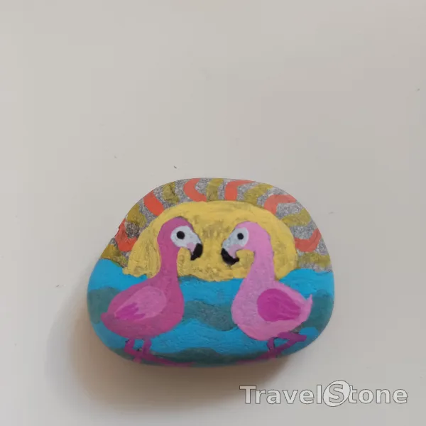 Painted painting stone by artist nad_doodles showing animals. Flamingos