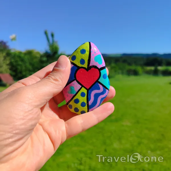 Painted painting stone by artist LaLiLu showing pattern. Travelstone with heart
