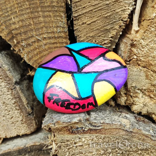 Painted painting stone by artist LaLiLu showing pattern. I've been looking for freedom..