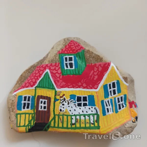 Painted painting stone by artist nad_doodles showing fantasy. Pippis Villa