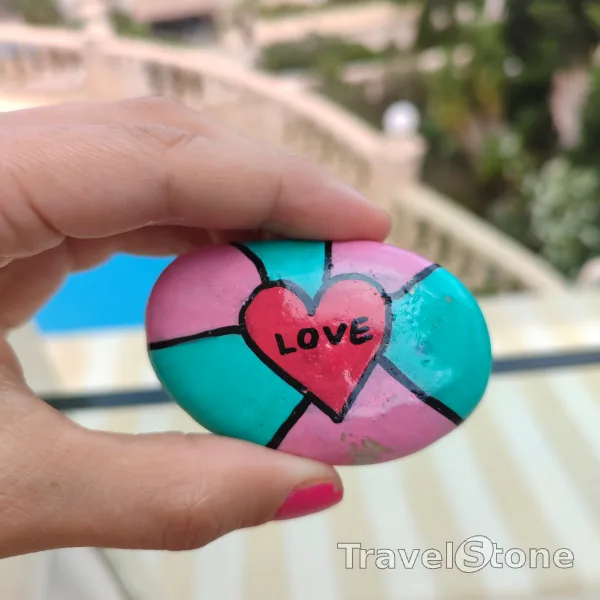 Painted painting stone by artist CJ showing sayings. Painted love TravelStone