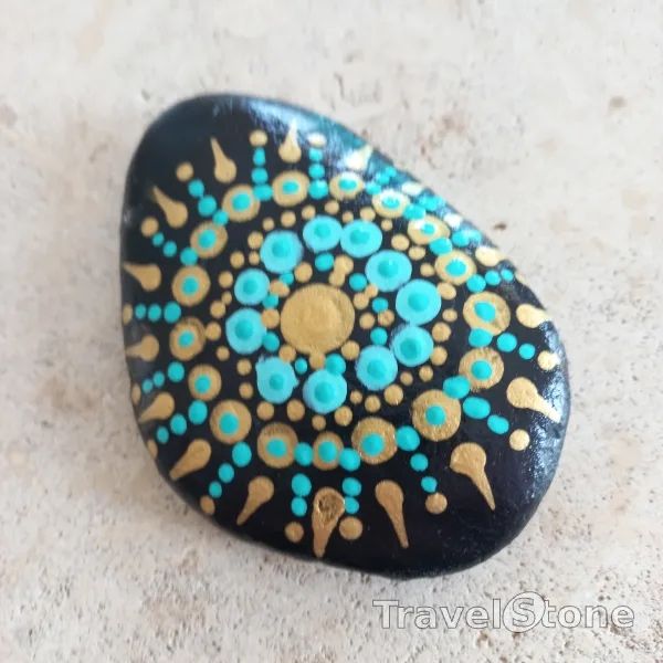 Painted dotting stone by artist Yumi showing pattern. Mandalastein