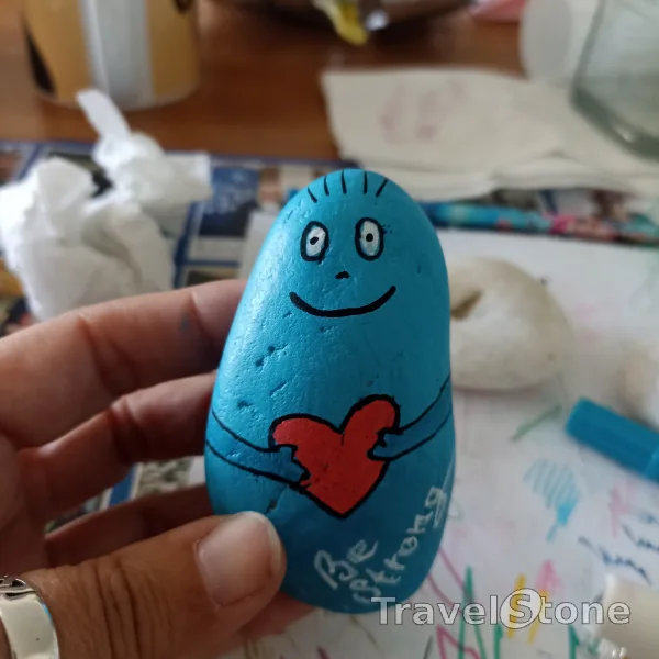 Painted painting stone by artist comfortinstones showing comic. Blue barbapapa "be strong"