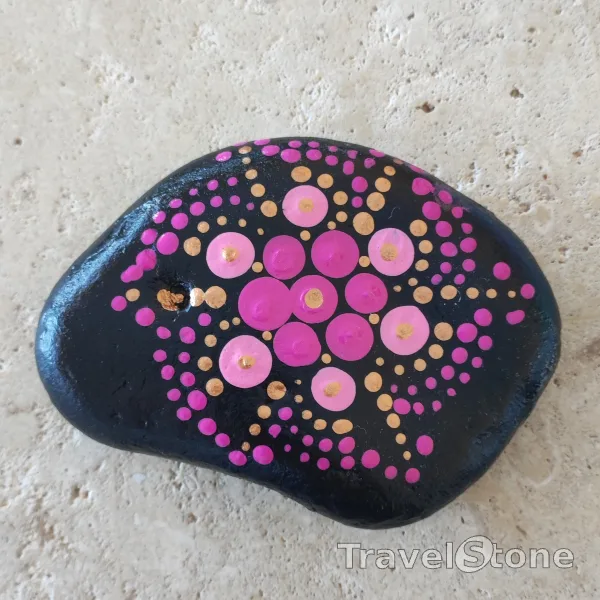 Painted dotting stone by artist LaLiLu showing pattern. Mandala